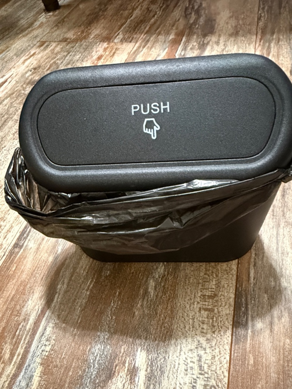 Black Push-Top Small Trash Can. Can hang in your car